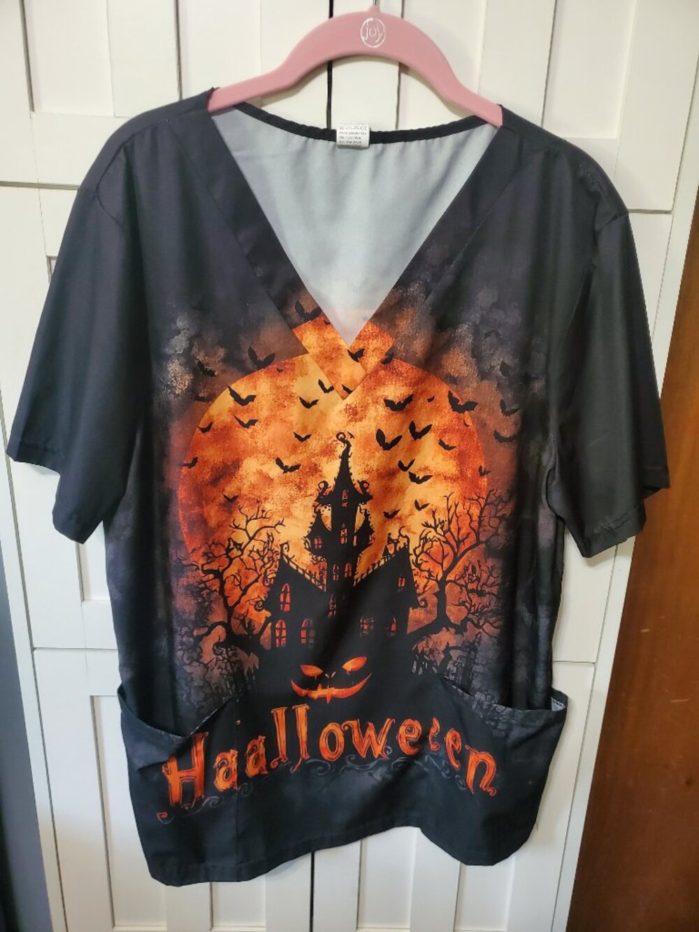 Size Medium Black Haunted House Scrub Top